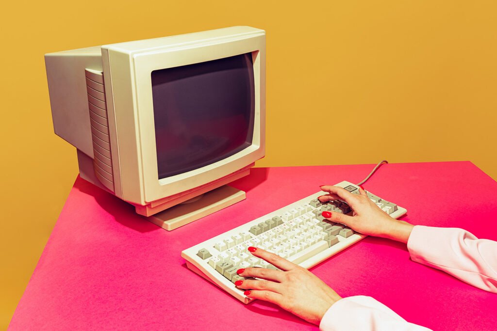 hands typing on keyboard